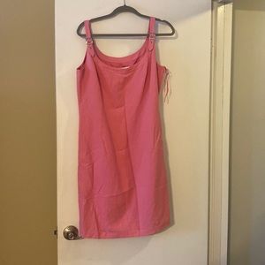 Brand new, pink sheath dress, with buckle detail on the straps.